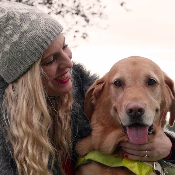 Guide dog owner Stacey with her around guide dog Toffee