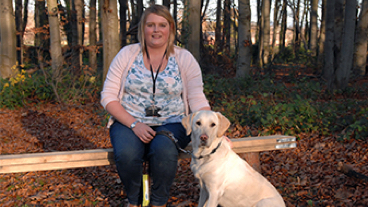 Lucy sat down with guide dog Olivia