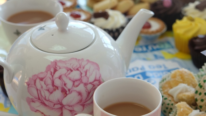 Tea pot and cakes