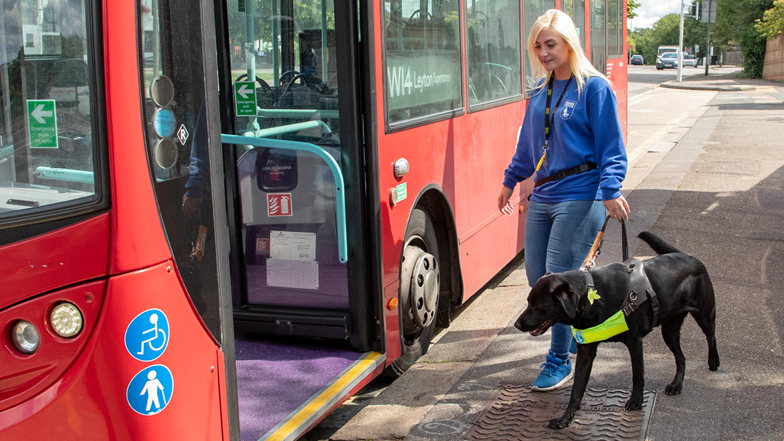 Bella guiding Helen onto a bus Bella guiding Helen onto a bus