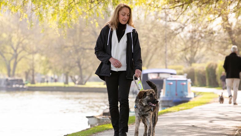 Fletcher and Jill on a walk next to a picturesque canal Fletcher and Jill on a walk next to a picturesque canal