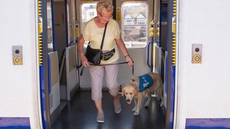 Joy and her Puppy Walker Jeanne on a train Joy and her Puppy Walker Jeanne on a train