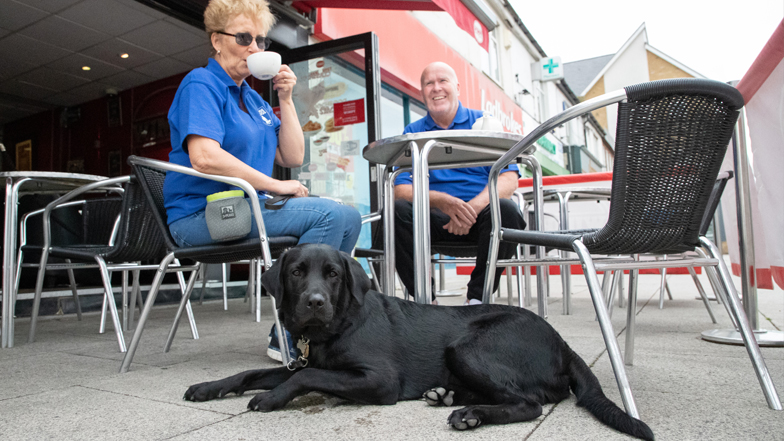 Milo sitting outside a cafe Milo sitting outside a cafe