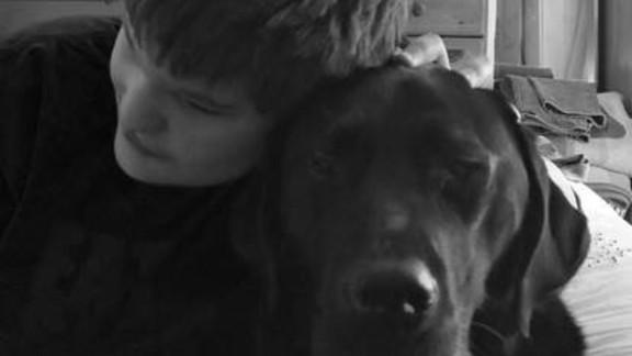 Logan with his Guide Dogs buddy dog Dan