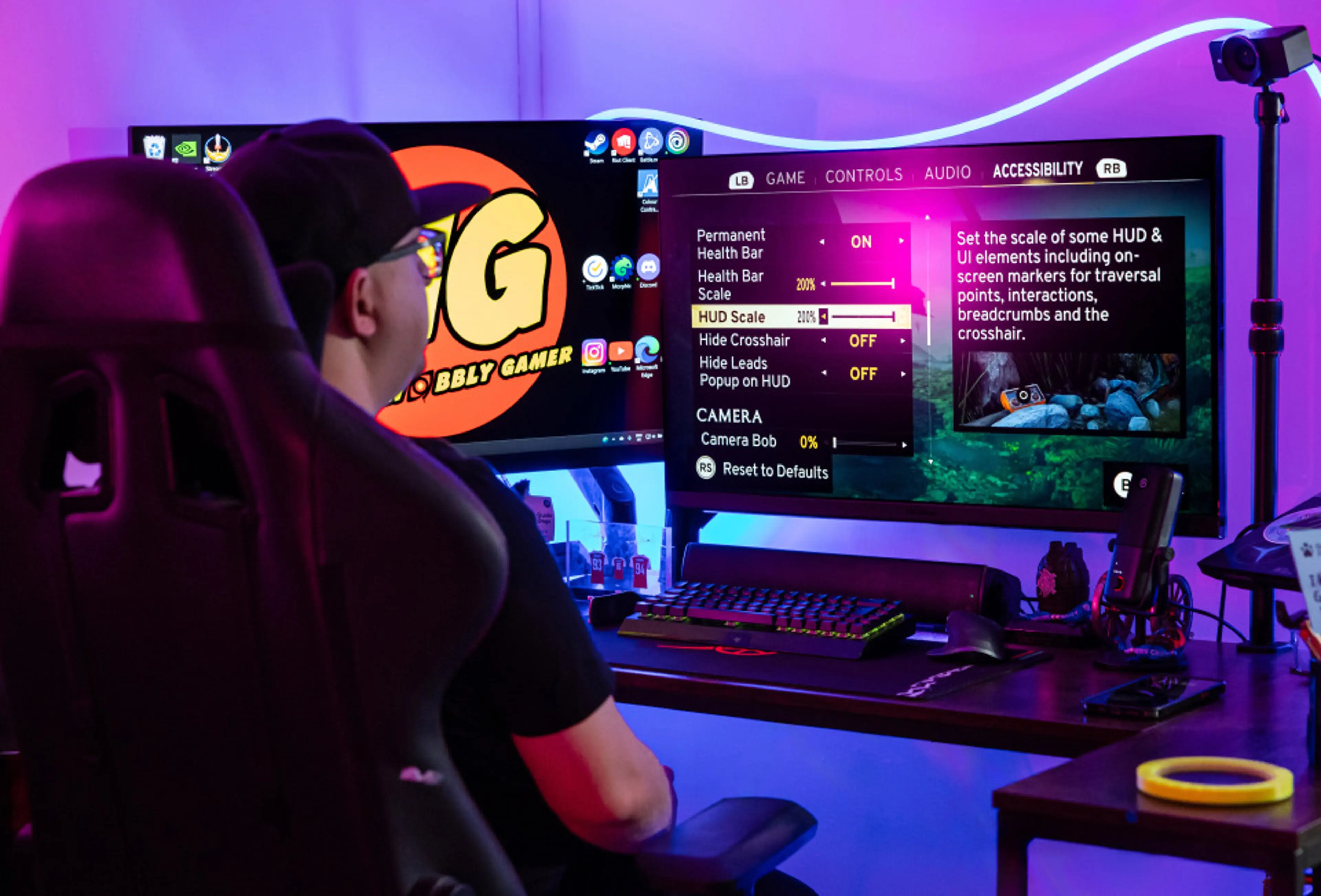 An image showing Mathew (The Wobbly Gamer) at his gaming setup .