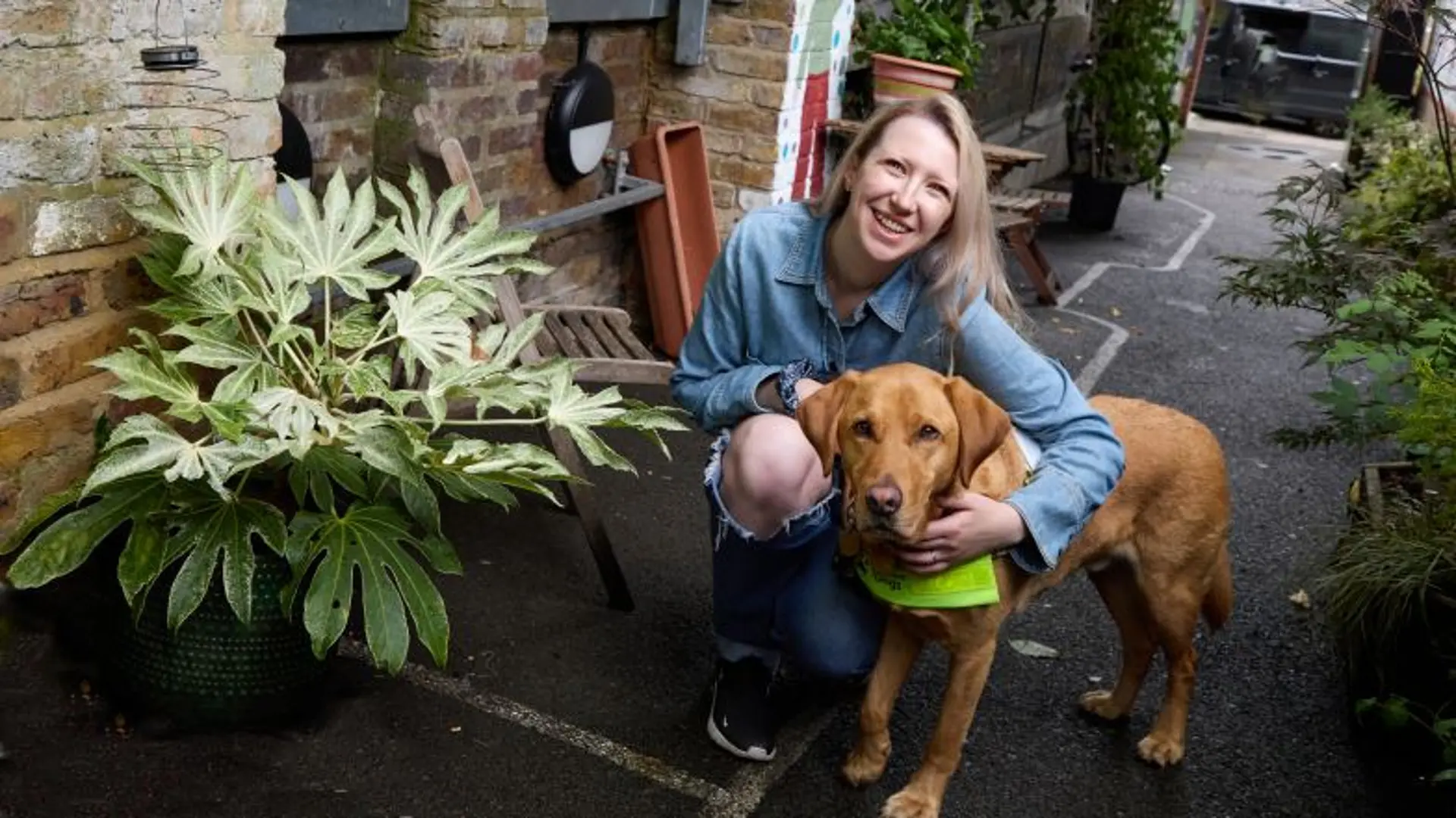 Portrait of Emma and guide dog Archie