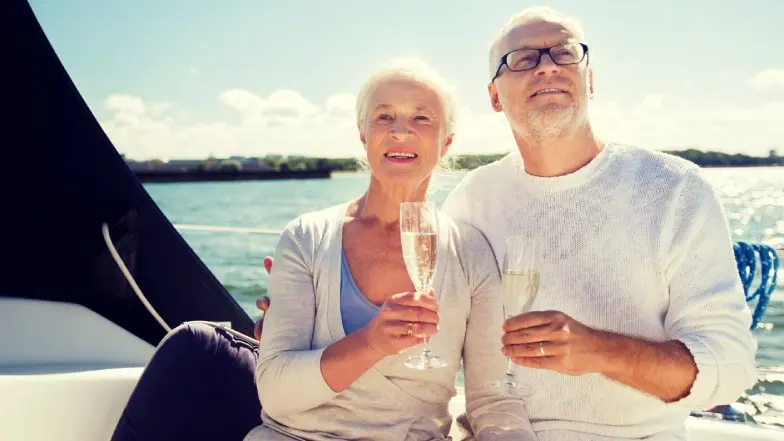 A couple sat on a yacht