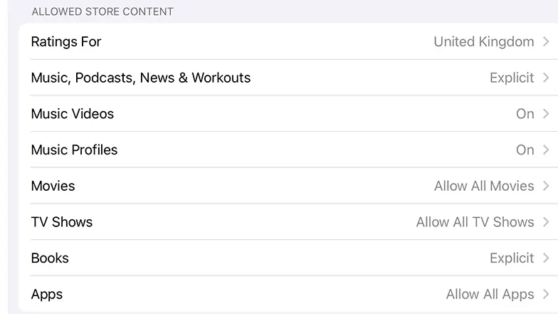 Apple device screen showing content restrictions menu