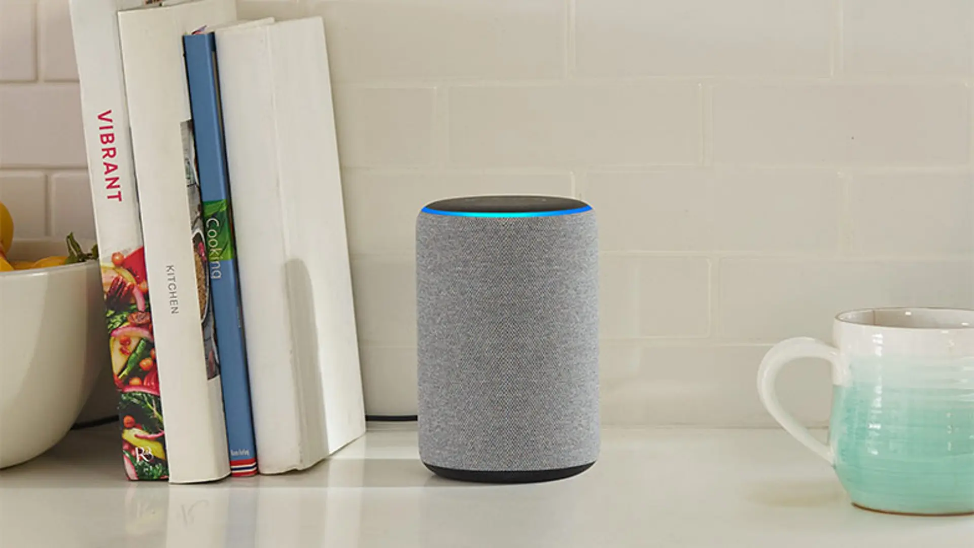 An image of an amazon echo device on a bookshelf