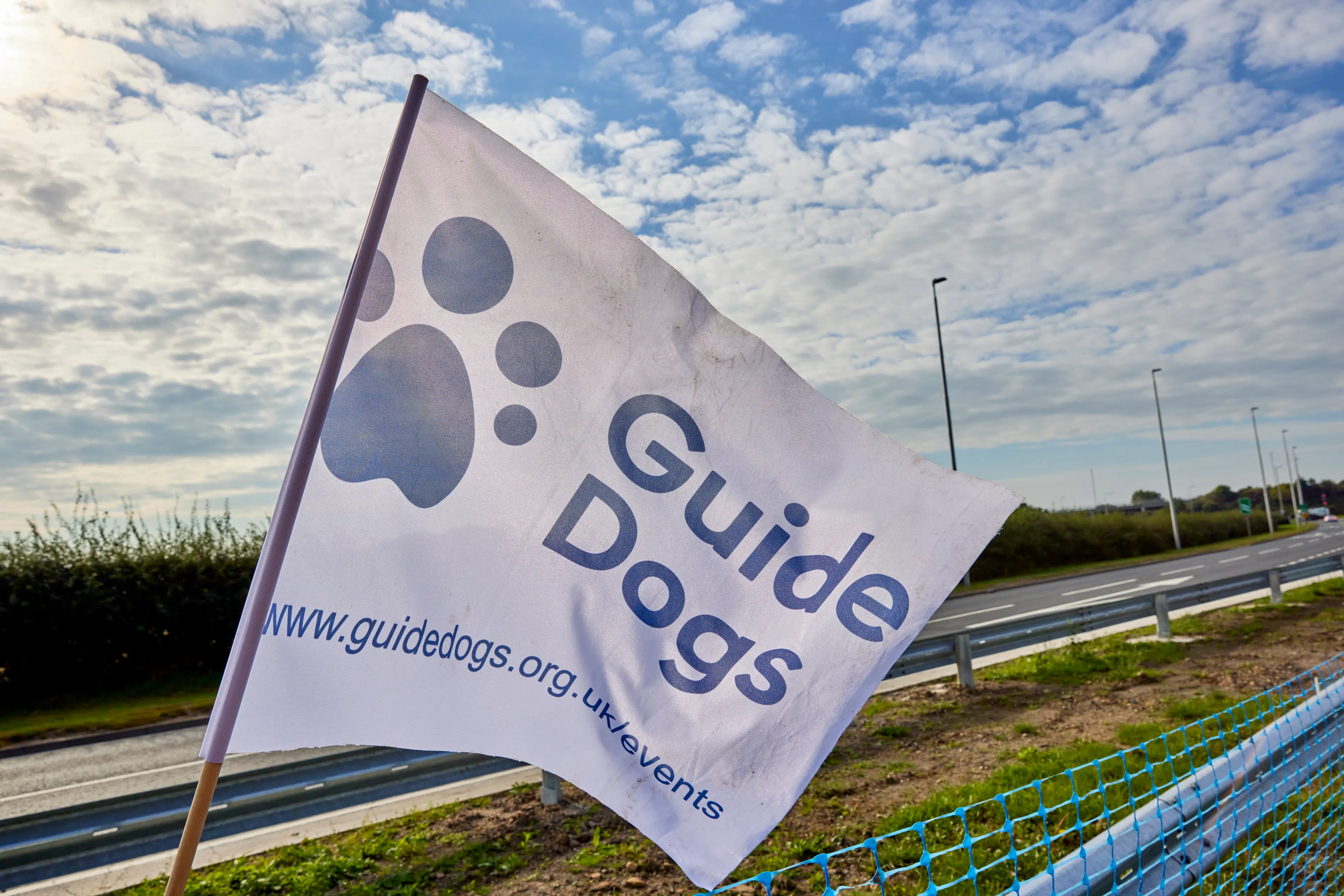 A Guide Dogs flag.