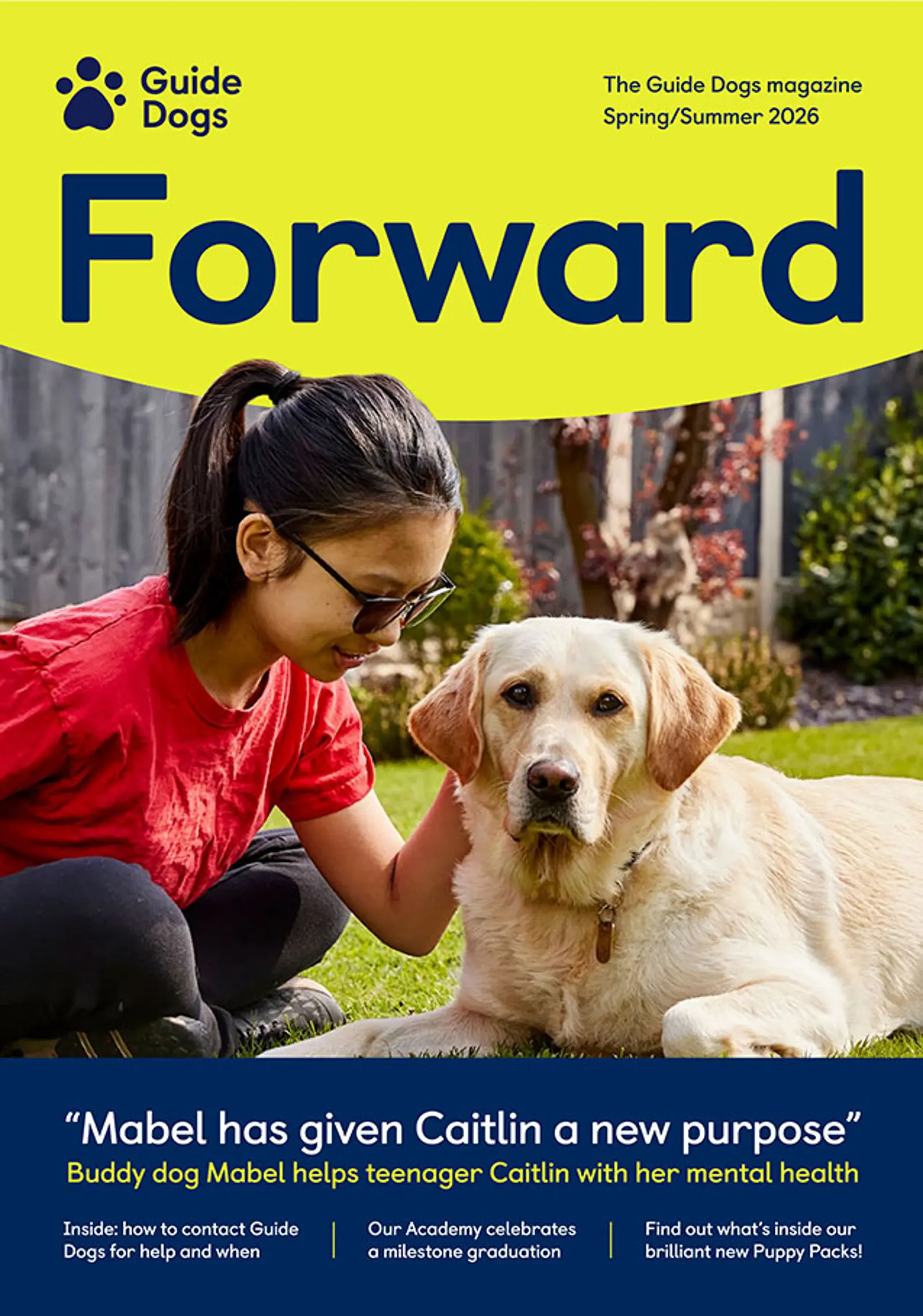 Front cover of the Spring/Summer Forward magazine. Buddy dog Mabel is lying down with buddy dog owner Caitlin sitting crosslegged next to Mabel with her hand gently on Mabel's neck.